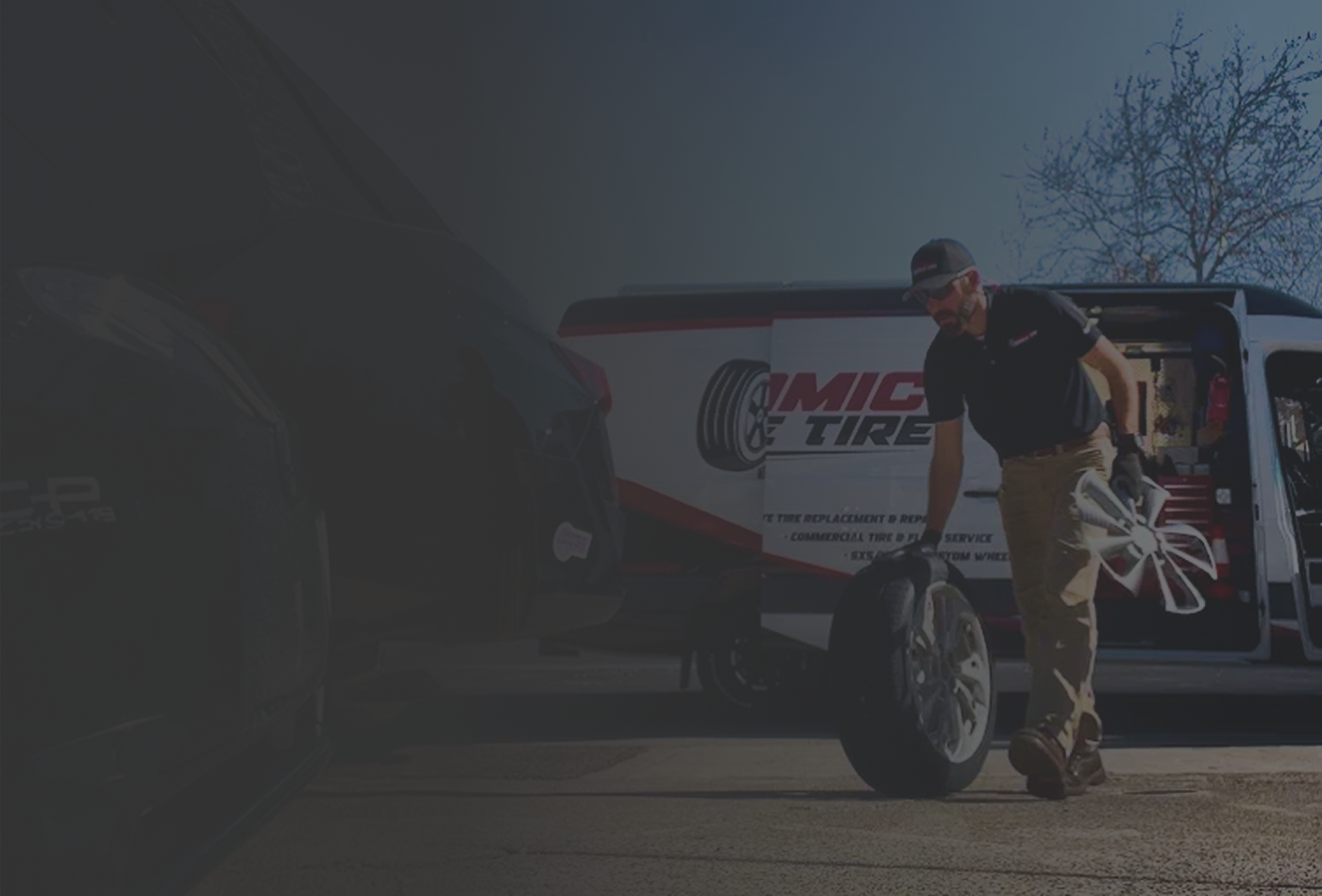 Dynamic Mobile Tire technician servicing a vehicle on location